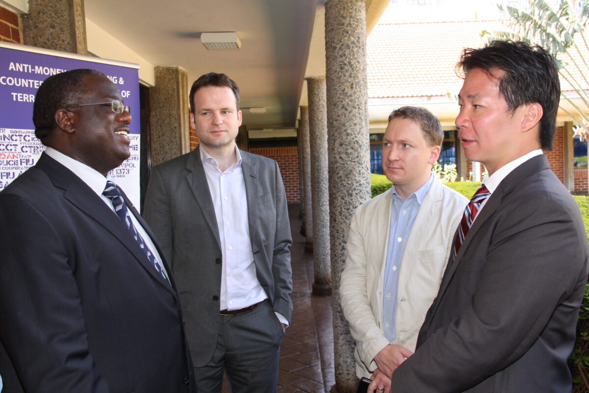 Group of professionals engaged in conversation during a networking event
